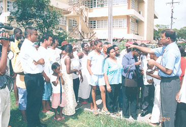 FUNDS PROMISE: President Bharrat Jagdeo meeting residents of Tiger Bay outside the West End Youth Centre yesterday. (Cullen Bess-Nelson photo)